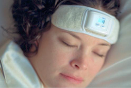 Woman wearing SleepGuard headband